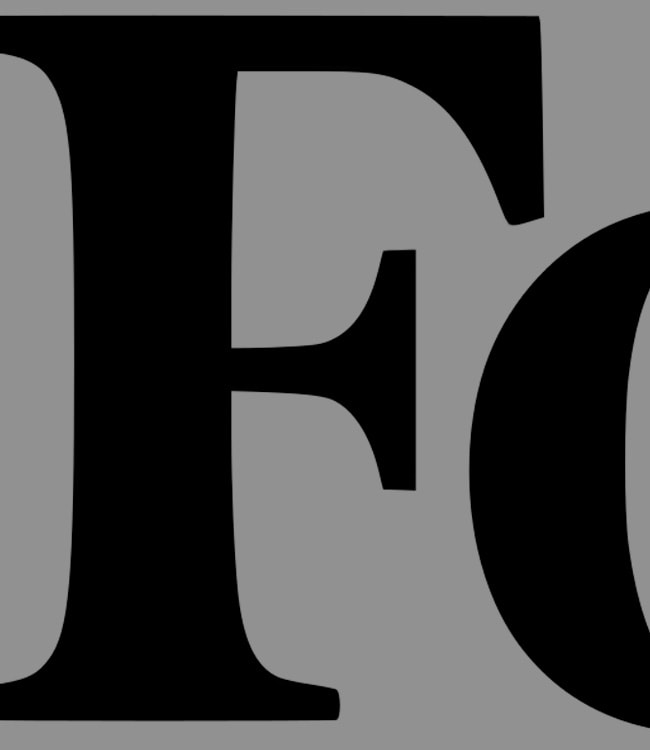 A image of a concrete sphere, balanced between two other larger spheres